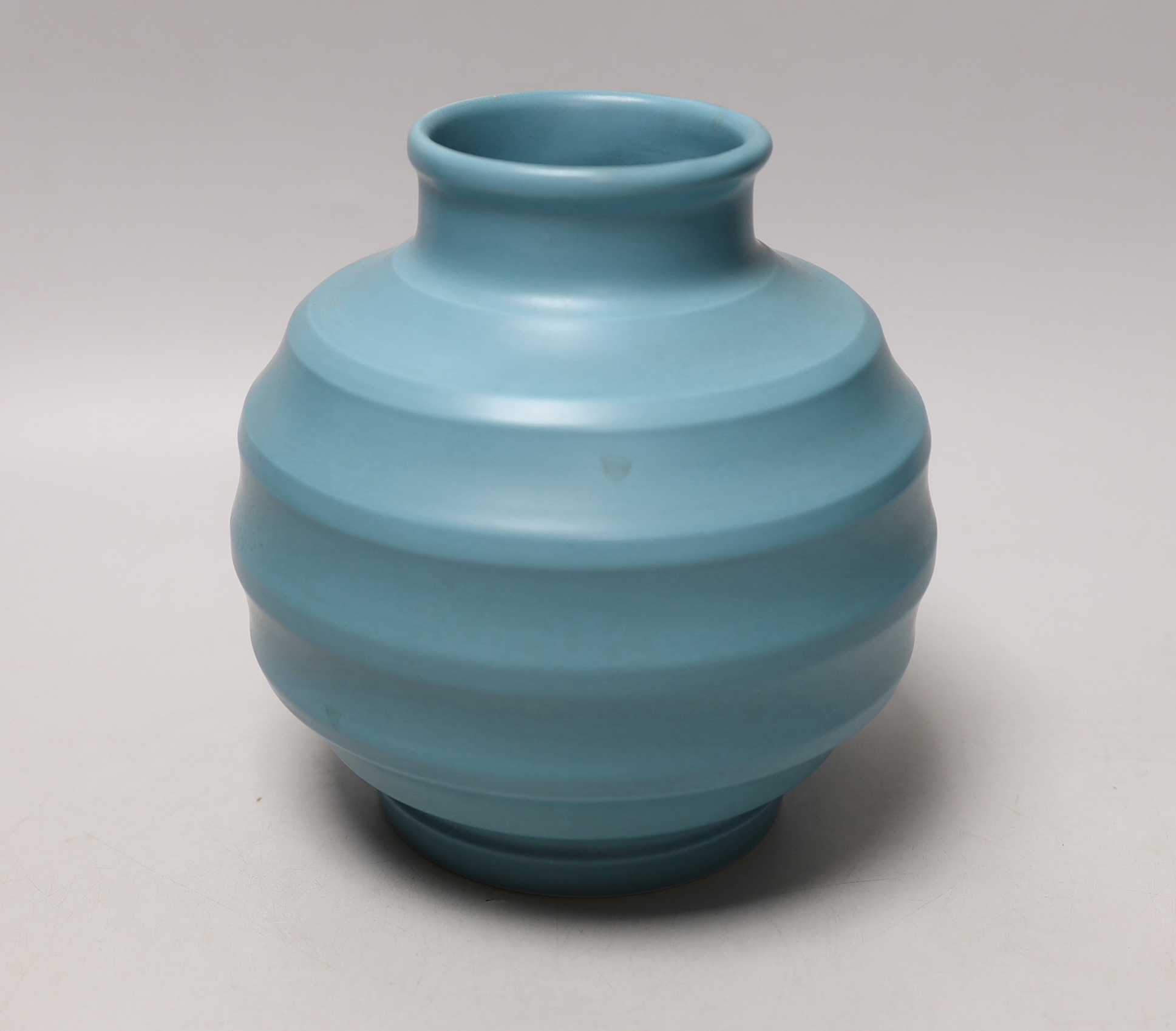 Keith Murray for Wedgwood - a blue glazed ribbed globular vase, 19cm high